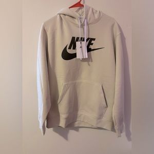 Brand New Large Nike Hoodie. (NWT)! Cream colored, with a black Nike swoosh.